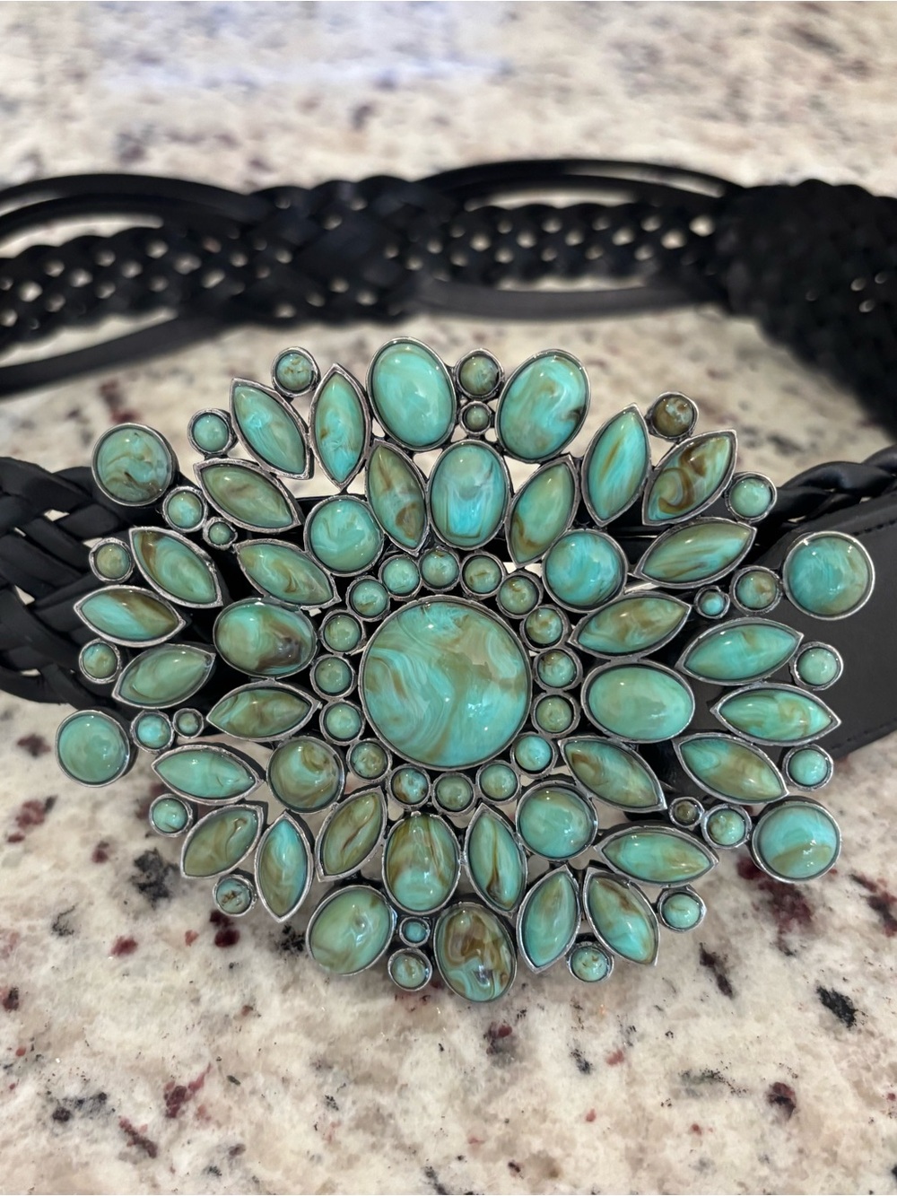 Montana Silversmith Turquoise Sunburst Belt Buckle on Black Braided Belt.